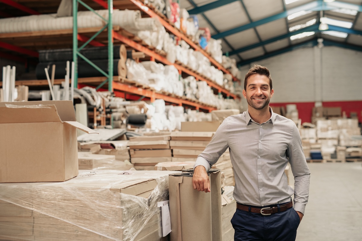 Professional businessman in warehouse setting